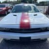 Horizontal photograph of a 2014DodgeChallengerRallye Redline Coupe 2D
