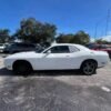 Horizontal photograph of a 2014DodgeChallengerRallye Redline Coupe 2D