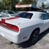 Horizontal photograph of a 2014DodgeChallengerRallye Redline Coupe 2D