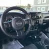 Horizontal photograph of a 2012JeepWranglerUnlimited Sport SUV 4D