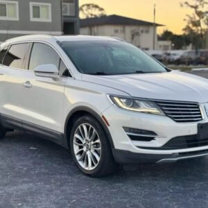 Horizontal photograph of a 2016LincolnMKCReserve Sport Utility 4D