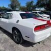 Horizontal photograph of a 2014DodgeChallengerRallye Redline Coupe 2D