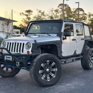 Horizontal photograph of a 2012JeepWranglerUnlimited Sport SUV 4D