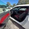 Horizontal photograph of a 2014DodgeChallengerRallye Redline Coupe 2D
