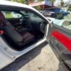 Horizontal photograph of a 2014DodgeChallengerRallye Redline Coupe 2D