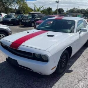 Horizontal photograph of a 2014DodgeChallengerRallye Redline Coupe 2D