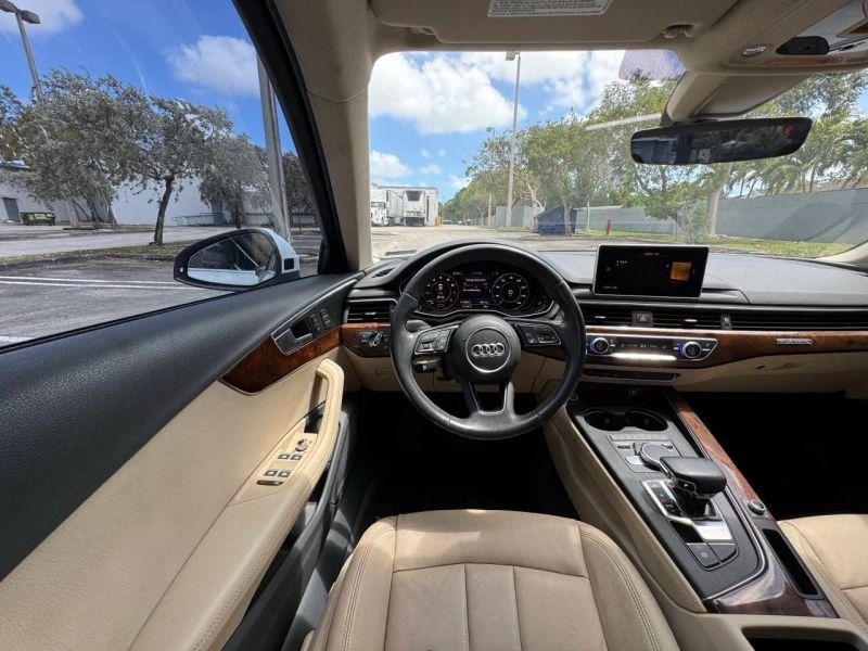 Horizontal photograph of a 2019AudiA4Premium Plus Sedan 4D