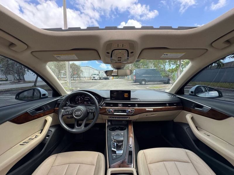 Horizontal photograph of a 2019AudiA4Premium Plus Sedan 4D