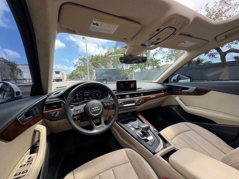 Horizontal photograph of a 2019AudiA4Premium Plus Sedan 4D