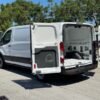 Horizontal photograph of a 2016FordTransit 150 VanLow Roof w/60/40 Side Door w/RWB Van 3D