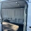 Horizontal photograph of a 2021FordTransit 250 Cargo VanMedium Roof w/LWB Van 3D