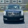 Horizontal photograph of a 2012CadillacEscaladeSport Utility 4D