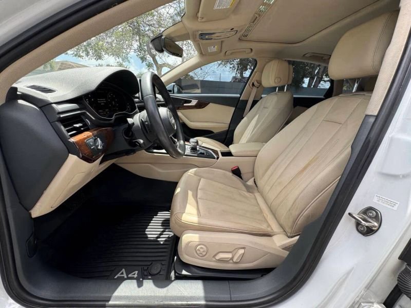 Horizontal photograph of a 2019AudiA4Premium Plus Sedan 4D