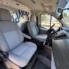 Horizontal photograph of a 2016FordTransit 150 VanLow Roof w/60/40 Side Door w/RWB Van 3D