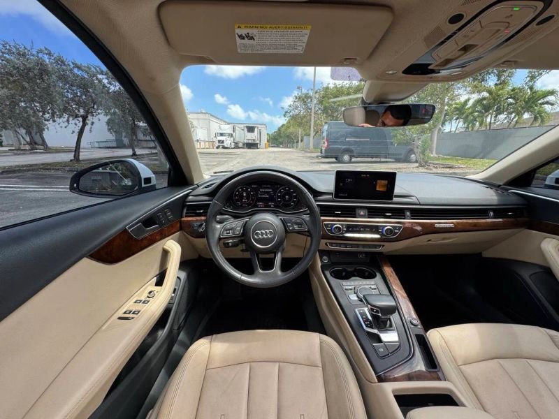 Horizontal photograph of a 2019AudiA4Premium Plus Sedan 4D