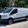 Horizontal photograph of a 2016FordTransit 150 VanLow Roof w/60/40 Side Door w/RWB Van 3D