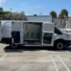 Horizontal photograph of a 2016FordTransit 150 VanLow Roof w/60/40 Side Door w/RWB Van 3D