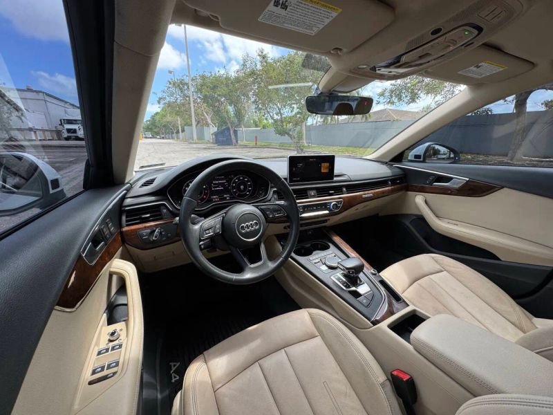 Horizontal photograph of a 2019AudiA4Premium Plus Sedan 4D