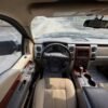 Horizontal photograph of a 2010FordF150 SuperCrew CabLariat Pickup 4D 6 1/2 ft