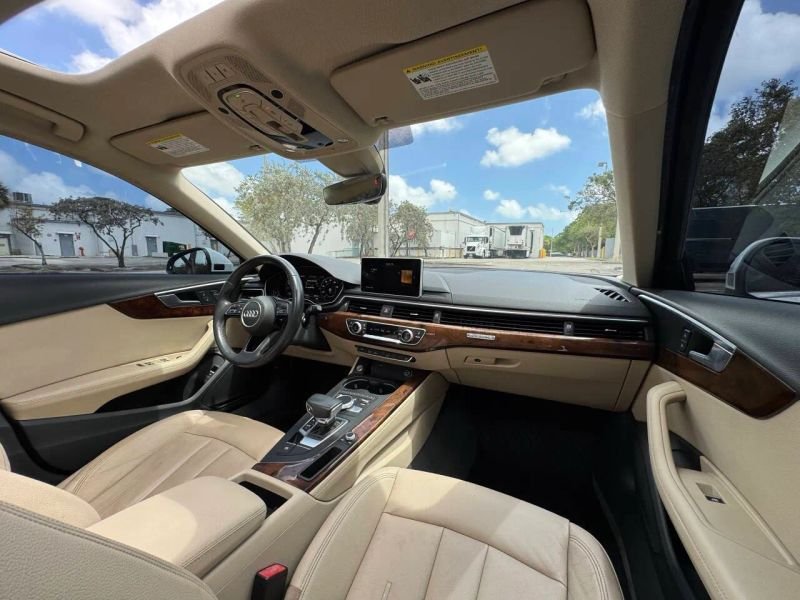 Horizontal photograph of a 2019AudiA4Premium Plus Sedan 4D