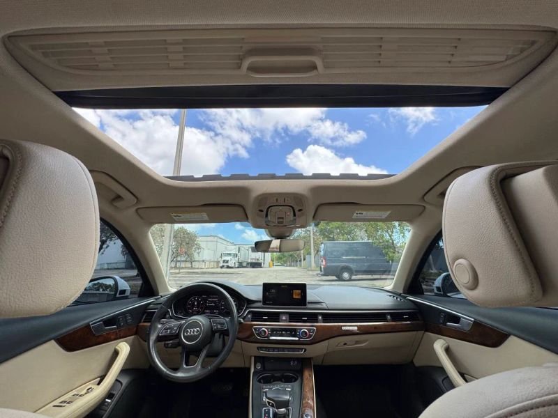Horizontal photograph of a 2019AudiA4Premium Plus Sedan 4D