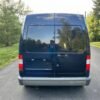 Horizontal photograph of a 2010FordTransit Connect PassengerXLT Van 4D