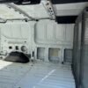 Horizontal photograph of a 2016FordTransit 150 VanLow Roof w/60/40 Side Door w/RWB Van 3D