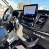 Horizontal photograph of a 2020FordTransit 150 Cargo VanLow Roof w/RWB Van 3D