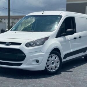 Horizontal photograph of a 2015FordTransit Connect CargoXLT Van 4D