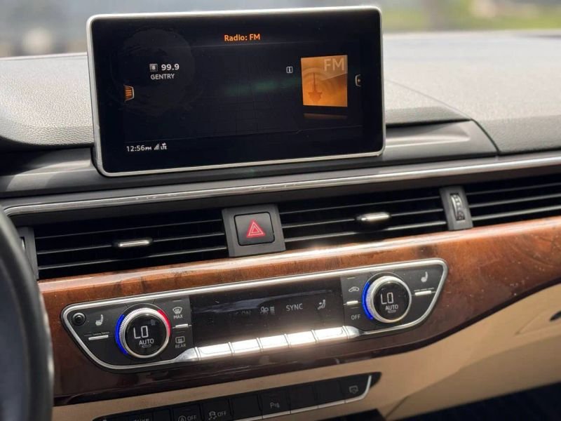 Horizontal photograph of a 2019AudiA4Premium Plus Sedan 4D