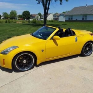 Horizontal photograph of a 2005Nissan350ZTouring Roadster 2D