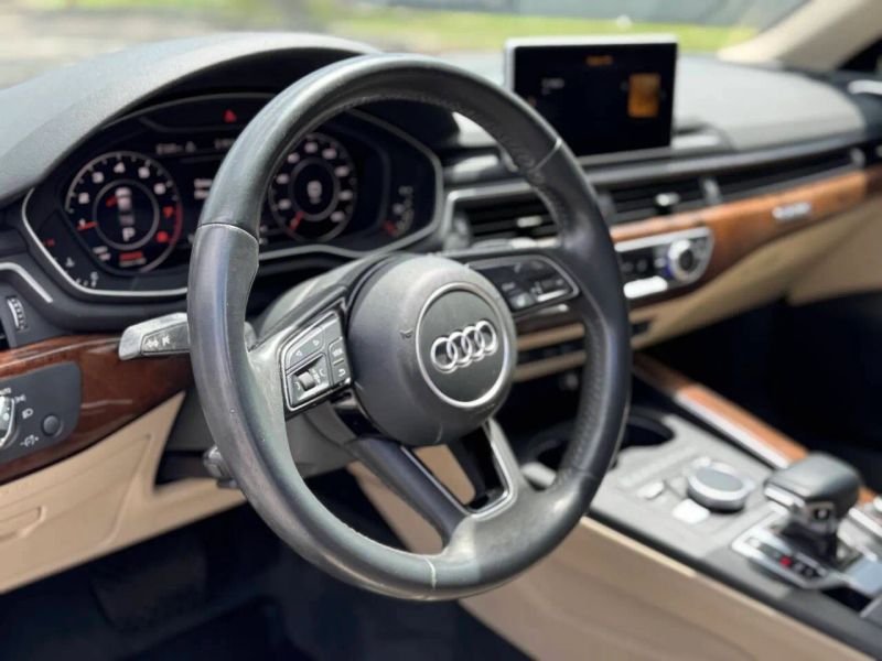 Horizontal photograph of a 2019AudiA4Premium Plus Sedan 4D