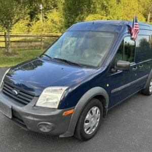Horizontal photograph of a 2010FordTransit Connect PassengerXLT Van 4D