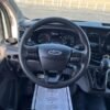 Horizontal photograph of a 2021FordTransit 250 Cargo VanHigh Roof Van 3D