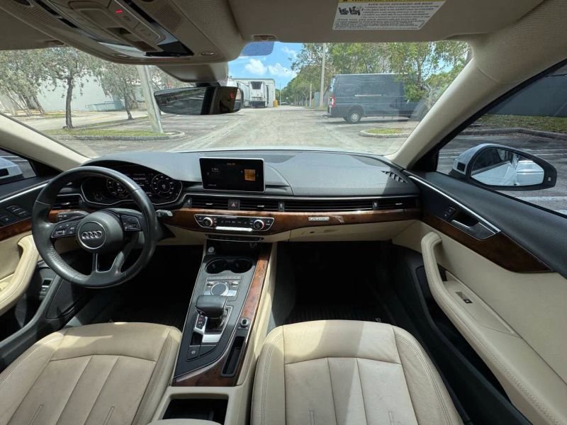 Horizontal photograph of a 2019AudiA4Premium Plus Sedan 4D