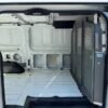 Horizontal photograph of a 2016FordTransit 150 VanLow Roof w/60/40 Side Door w/RWB Van 3D