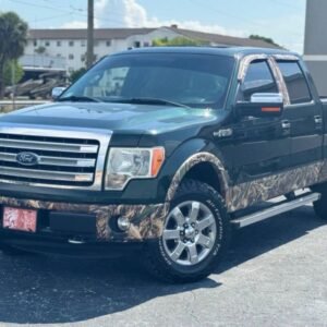 Horizontal photograph of a 2013FordF150 SuperCrew CabLariat Pickup 4D 5 1/2 ft