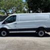Horizontal photograph of a 2016FordTransit 150 VanLow Roof w/60/40 Side Door w/RWB Van 3D
