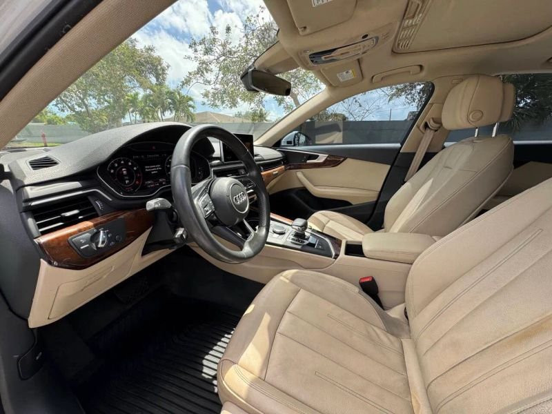 Horizontal photograph of a 2019AudiA4Premium Plus Sedan 4D