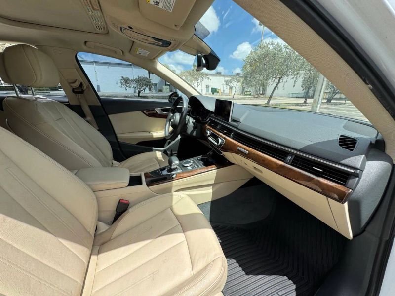 Horizontal photograph of a 2019AudiA4Premium Plus Sedan 4D