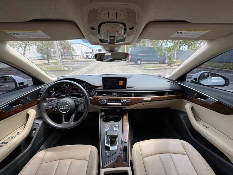 Horizontal photograph of a 2019AudiA4Premium Plus Sedan 4D