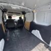 Horizontal photograph of a 2015FordTransit Connect CargoXLT Van 4D