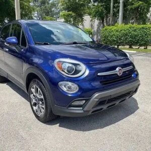 Horizontal photograph of a 2016FIAT500XTrekking Sport Utility 4D