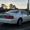 Horizontal photograph of a 2000CadillacSevilleSTS Touring Sedan 4D