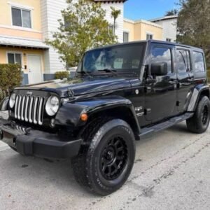 Horizontal photograph of a 2013JeepWranglerUnlimited Sahara Sport Utility 4D