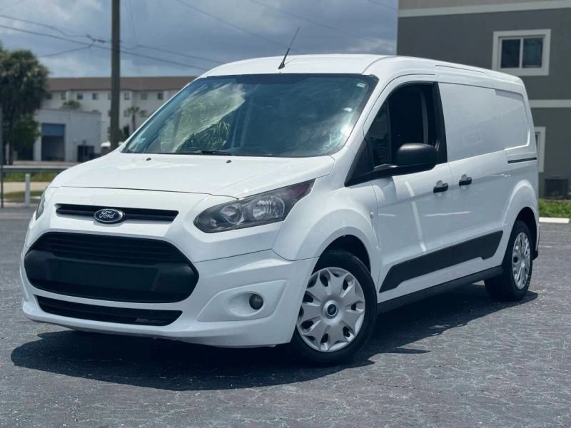 Horizontal photograph of a 2015FordTransit Connect CargoXLT Van 4D
