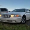Horizontal photograph of a 2000CadillacSevilleSTS Touring Sedan 4D
