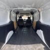 Horizontal photograph of a 2015FordTransit Connect CargoXLT Van 4D
