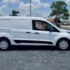 Horizontal photograph of a 2015FordTransit Connect CargoXLT Van 4D