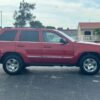 Horizontal photograph of a 2006JeepGrand CherokeeLimited Sport Utility 4D